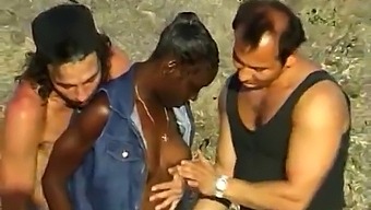 Three White Men Pleasure A Black Woman At The Beach