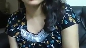 Middle-Aged Indian Woman With Large Breasts Engages In Video Call With Her Partner