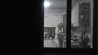 Voyeuristic Neighbor Watches Naked Neighbor In Kitchen Preparing Dinner For Husband
